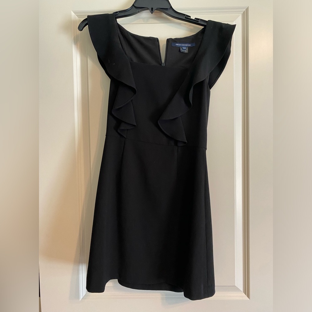 French Connection black dress. Zips up back. Only worn twice.
